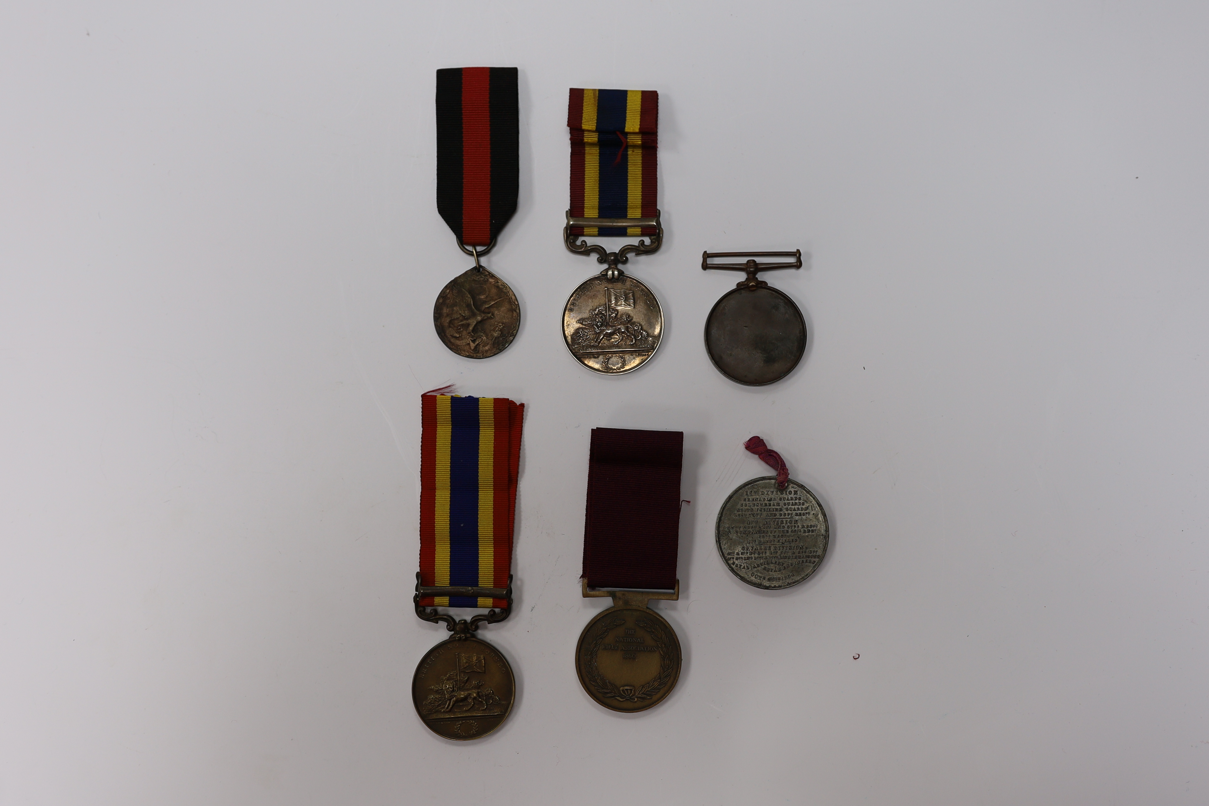 Assorted medals; two replica British North Borneo medals; Balaklava medallion; bronze GV medal; German China Campaign medal; bronze NRA medallion, unnamed